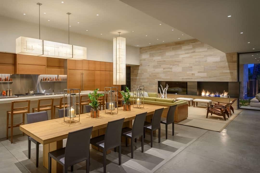 Open dining room with long table for multi-generational gatherings